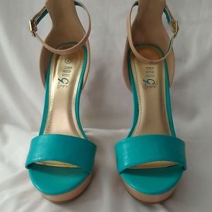 Rouge high heeled shoes